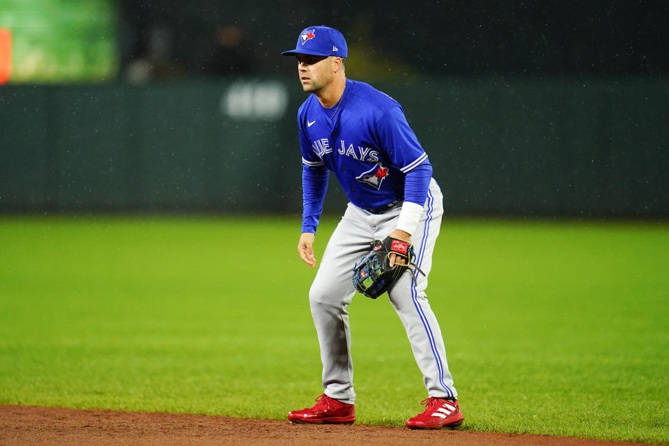 Toronto Blue Jays second baseman Whit Merrifield waits for a pitch to the Baltimore Orioles during the fourth inning of a baseball game, Monday, Oct. 3, 2022, in Baltimore. (AP Photo/Julio Cortez)