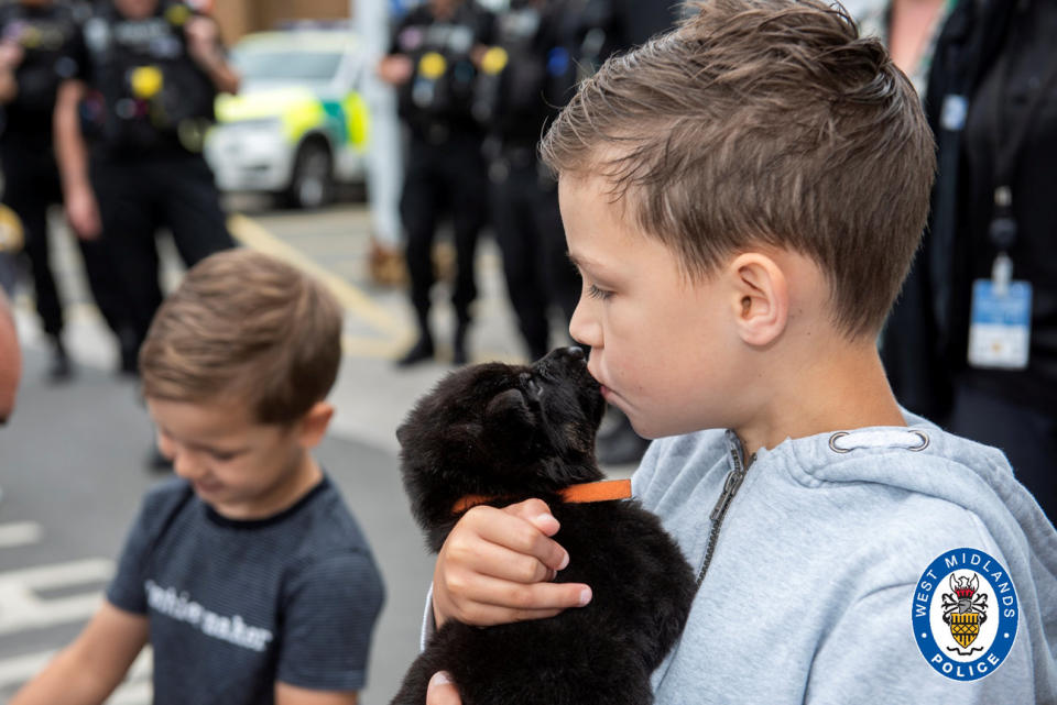 Oscar also met some new puppy recruits during his visit. (SWNS)