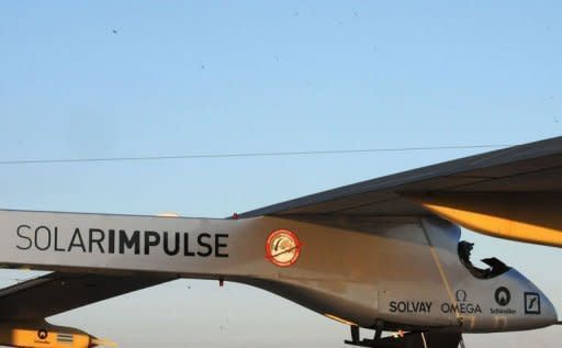 Solar-powered aircraft Solar Impulse, piloted by Bertrand Piccard of Switzerland, prepares for take-off from Rabat airport on June 21 for a voyage across the Moroccan desert to Ouarzazate. The Swiss-made plane early Friday completed a flight over the Moroccan desert to showcase renewable energy, as a key summit in Rio discussed "greening" the world economy