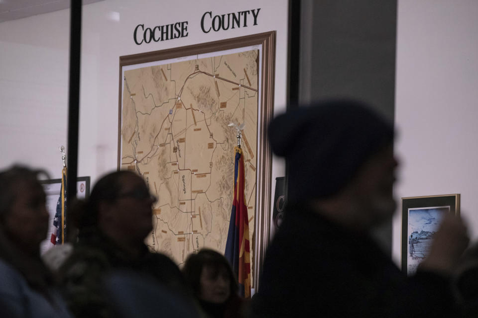 Members of the public attend Cochise County Board of Supervisors meeting to provide feedback on the proposed transfer of election functions and duties to the county recorder, Tuesday, Feb. 14, 2023, in Bisbee, Ariz. (AP Photo/Alberto Mariani)