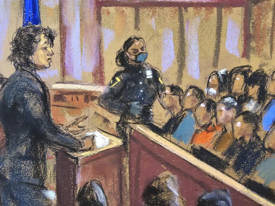 Prosecutor Susan Hoffinger stands at the podium during jury selection of former President Donald Trump's criminal trial in this courtroom sketch.