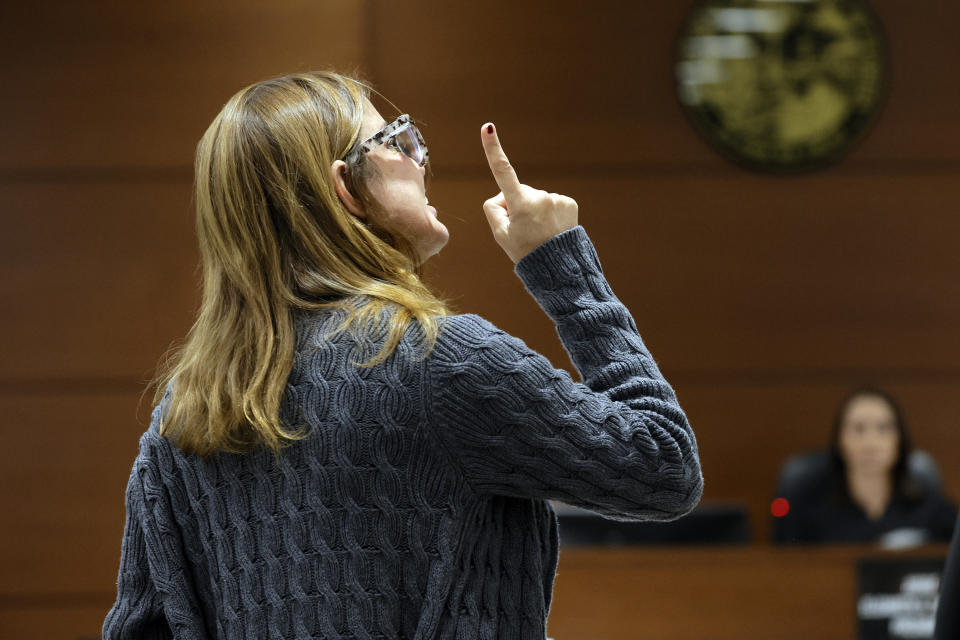 Patricia Padauy Oliver speaks during her victim impact statement in the sentencing hearing for Marjory Stoneman Douglas High School shooter Nikolas Cruz at the Broward County Courthouse in Fort Lauderdale, Fla. on Tuesday, Nov. 1, 2022. Padauy Oliver's son, Joaquin Oliver, was killed in the 2018 shootings. Cruz was sentenced to life in prison for murdering 17 people at Parkland's Marjory Stoneman Douglas High School more than four years ago. (Amy Beth Bennett/South Florida Sun Sentinel via AP, Pool)