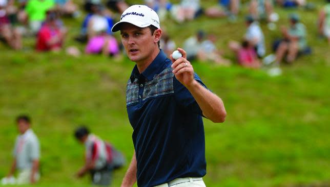 Justin Rose reacts after clinching the US Open title.