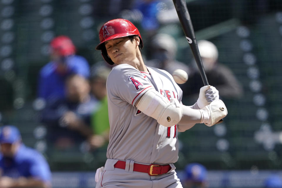 Los Angeles Angels Shohei Ohtani ducks a high and inside pitch during the fifth inning of a baseball game against the Seattle Mariners, Sunday, May 2, 2021, in Seattle. (AP Photo/Ted S. Warren)