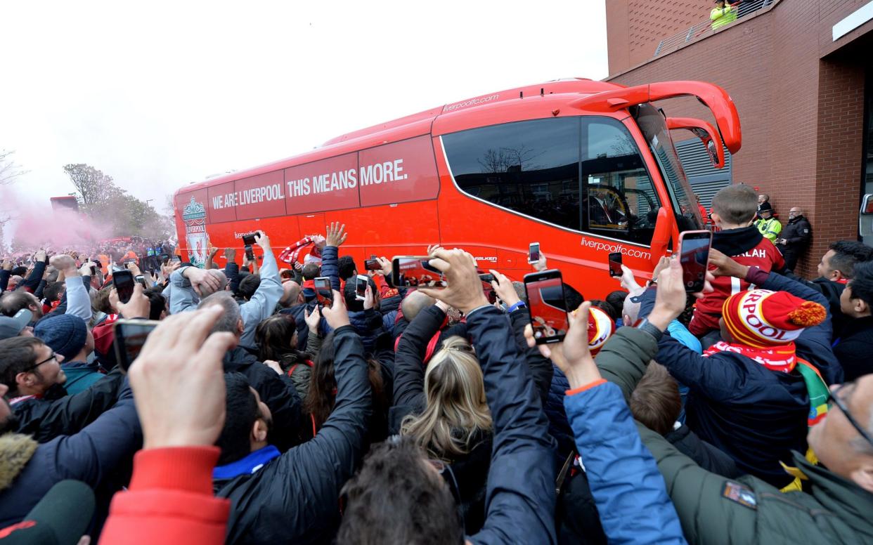 Liverpool fans waiting outside the stadium for the Liverpool Team Bus before the UEFA Champions semi final second leg soccer match between Liverpool and Barcelona held at the Anfield  - PETER POWELL/EPA-EFE/Shutterstock
