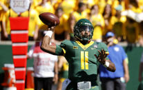 Baylor quarterback Gerry Bohanon (11) throws against BYU during the first half of an NCAA college football game, Saturday, Oct. 16, 2021, in Waco, Texas. (AP Photo/Ron Jenkins)