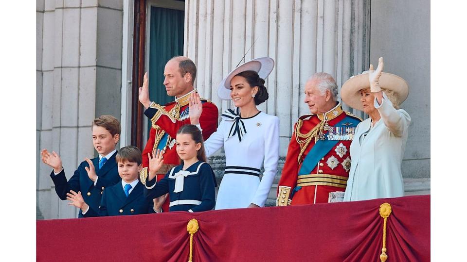 Prince William, Kate Middleton, King Charles and Queen Camilla wave on the balcony of Buckingham Palace