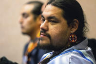 A supporter of Nathan Chasing Horse watching court proceedings, Monday, Feb. 6, 2023, in North Las Vegas, Nev. Nathan Chasing Horse appeared in court for the second time after his arrest on charges of sexual assault and human trafficking. (AP Photo/Ty O'Neil)