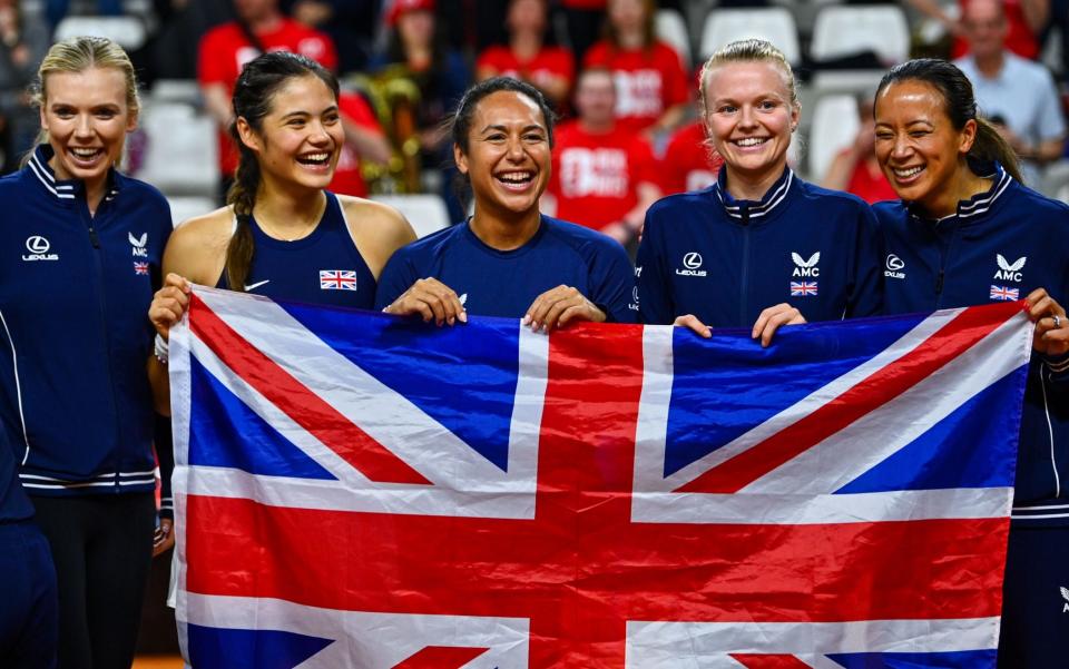 The GB team celebrate with flag after beating France