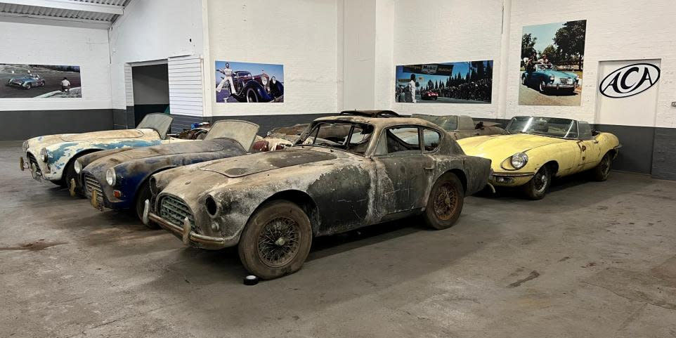A treasure trove of classic 50 year old cars found inside a padlocked shed are to be auctioned.The car collection, including three 1970 Jaguar E types, was found by Guy Snelling who works for Anglia Car Auctions in King's Lynn, Norfolk. See SWNS story SWLScars. Other astonishing finds in the collection include a 1955 AC Aceca, and a 1957 AC Ace Bristol.One of the AC Ace Bristols found was owned by Betty Haig, a leading racing driver in the 1960s making it one of the first AC Aces built by the company.