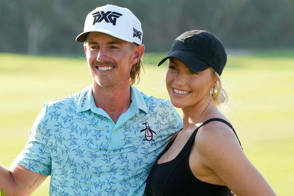 <p>Fernando Llano/AP</p> Jake Knapp and Makena White during the award ceremony after winning the Mexico Open golf tournament on February 25, 2024.