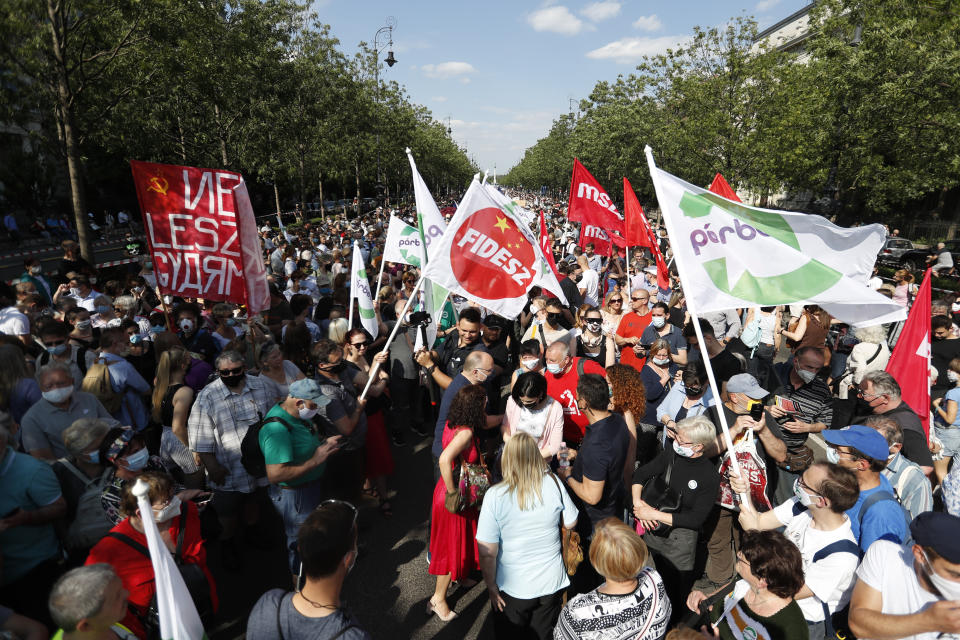 Protesters gather in Budapest, Hungary, Saturday, June 5, 2021. Thousands of people gathered opposing the Hungarian government's plan of building a campus for China's Fudan University in Budapest. (AP Photo/Laszlo Balogh)