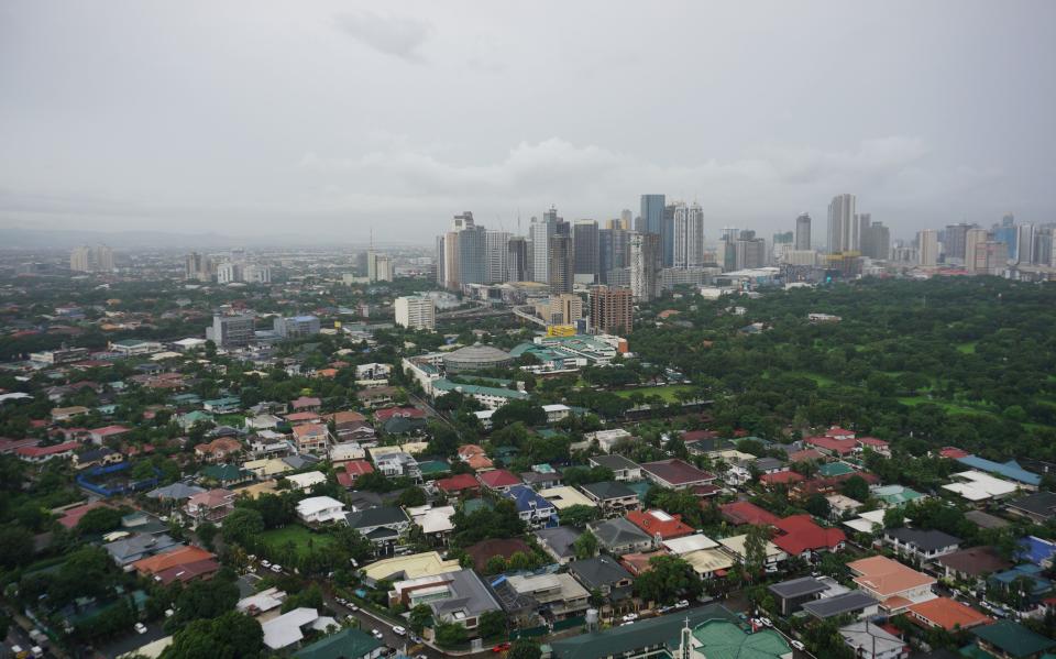 FILE PHOTO: A esidential area with condominium and commercial development projects is pictured in the Ortigas Pasig district of suburban Manila. (Photo: TED ALJIBE/AFP via Getty Images)