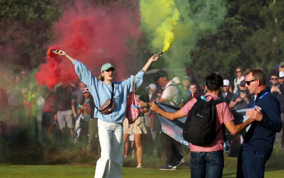 Protestors make their way onto the 17th green -  Just Stop Oil protestors let off flares at Women's Open