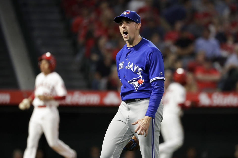 Toronto Blue Jays starting pitcher Aaron Sanchez reacts after giving up two runs to the Los Angeles Angels during the second inning of a baseball game in Anaheim, Calif., Thursday, May 2, 2019. (AP Photo/Chris Carlson)