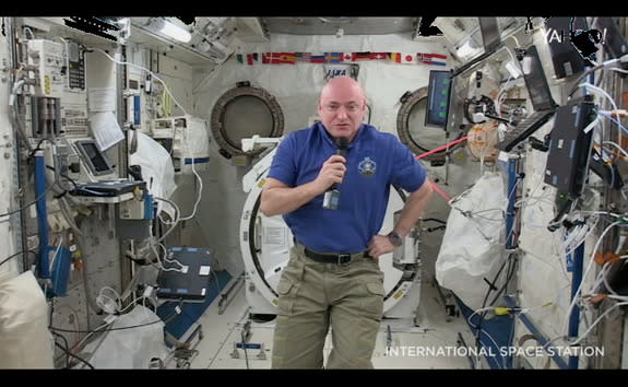 Aboard the International Space Station, astronaut Scott Kelly talks to journalist Katie Couric on Aug. 19, 2015.