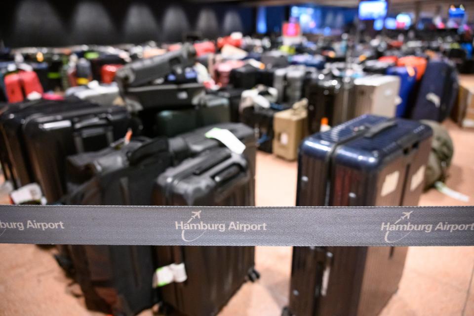 Hamburg Airport suitcase pile