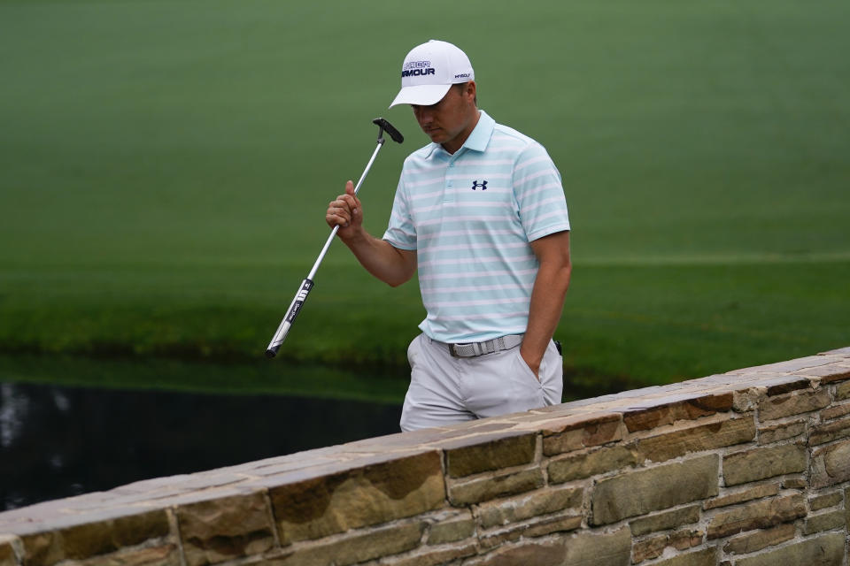 Jordan Spieth walks across the Sarazen Bridge on the 15th hole during the third round of the Masters golf tournament on Saturday, April 10, 2021, in Augusta, Ga. (AP Photo/Matt Slocum)