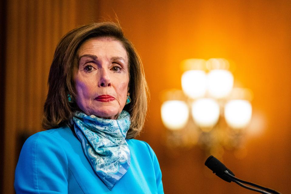 House Speaker Nancy Pelosi of Calif., listens to a reporter's question during a news conference on Capitol Hill on May 7.