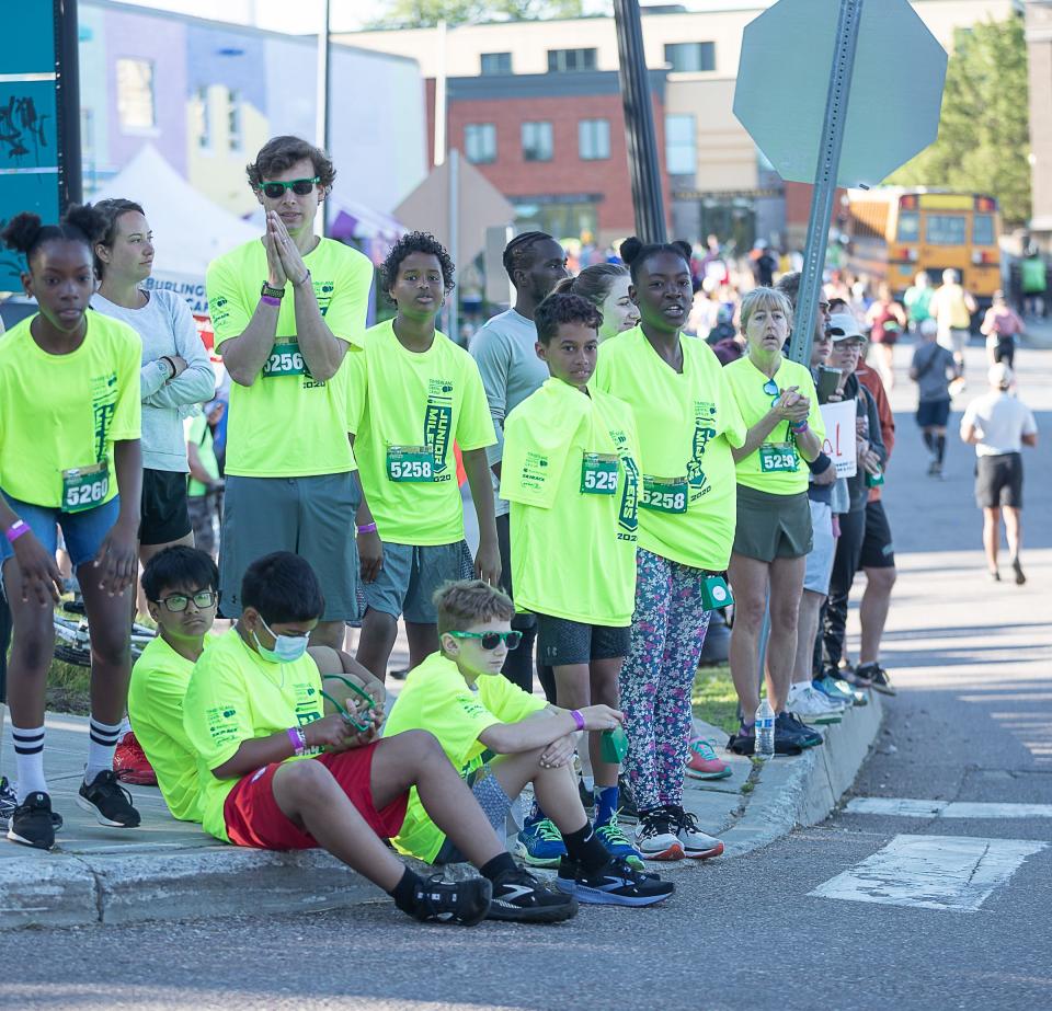 The Burlington Boys and Girls Club cheer on the runners during the M&T Bank Vermont City Marathon & Relay.