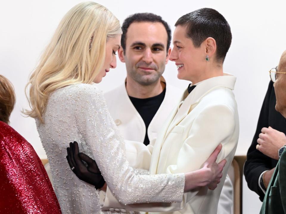 Elizabeth Debicki, Khalid Abdalla, and Emma Corrin attend "The Crown" finale celebration at the Royal Festival Hall in London on December 5, 2023.