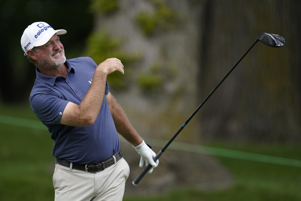 Jerry Kelly watches his shot off the 10th tee during the final round of the PGA Tour Champions Principal Charity Classic golf tournament, Sunday, June 5, 2022, in Des Moines, Iowa. (AP Photo/Charlie Neibergall)