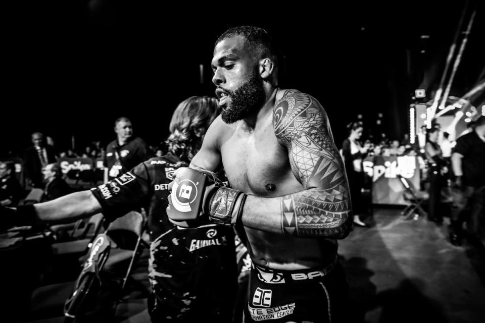 Jordan Young walks to the cage to fight Tim Caron on April 21, 2017. Young, an Urbandale native, won the fight by submission in the first round.