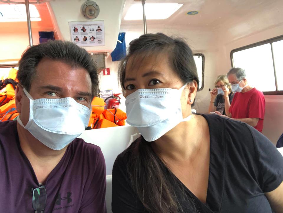 Rick and Wendy de Pinho, passengers aboard the virus-stricken Zaandam cruise ship, while they transferred to the Rotterdam cruise ship on Sunday. | Courtesy of Rick and Wendy de Pinho