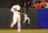 SAN FRANCISCO, CA - OCTOBER 24: Angel Pagan #16 of the San Francisco Giants catch make a play on Jhonny Peralta #27 of the Detroit Tigers two run home run against Jose Mijares #50 of the San Francisco Giants in the ninth inning during Game One of the Major League Baseball World Series at AT&T Park on October 24, 2012 in San Francisco, California. (Photo by Doug Pensinger/Getty Images)