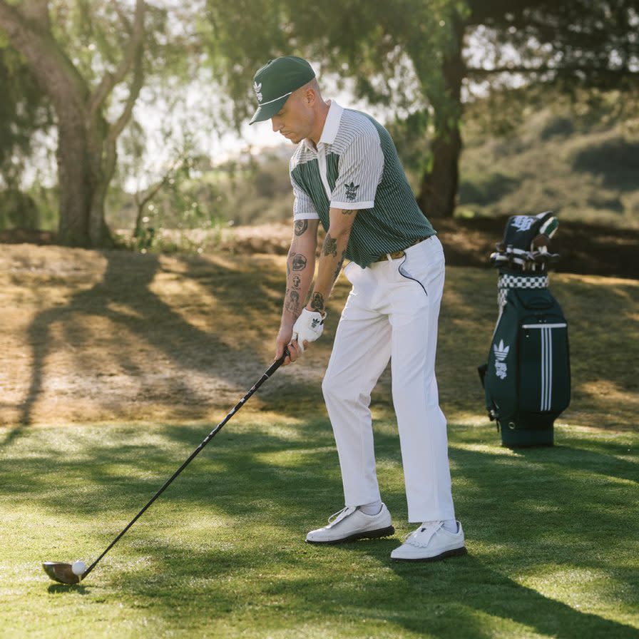 Macklemore wearing pieces from the new Adidas x Bogey Boys collection including the new MC80 golf shoe