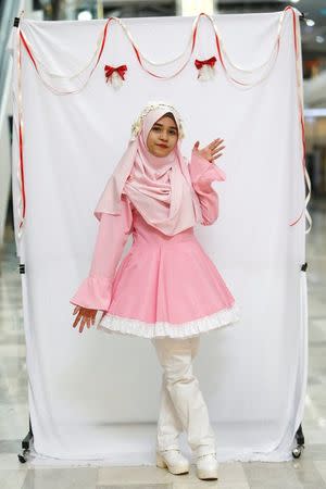 Muslim cosplayer Nurul Syakirah, 23, poses during a cosplay event at a mall in Petaling Jaya, near Kuala Lumpur, Malaysia July 8, 2017. Picture taken July 8, 2017. REUTERS/Lai Seng Sin