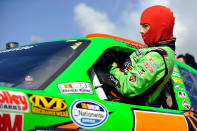 HOMESTEAD, FL - NOVEMBER 19: Danica Patrick, driver of the #7 GoDaddy.com Chevrolet, climbs in her car on the grid during qualifying for the NASCAR Nationwide Series Ford 300 at Homestead-Miami Speedway on November 19, 2011 in Homestead, Florida. (Photo by Jared C. Tilton/Getty Images)