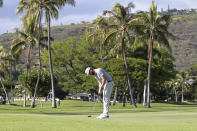 Chris Kirk putts on the 13th green during the third round at the Sony Open golf tournament Saturday, Jan. 16, 2021, in Honolulu. (AP Photo/Marco Garcia)