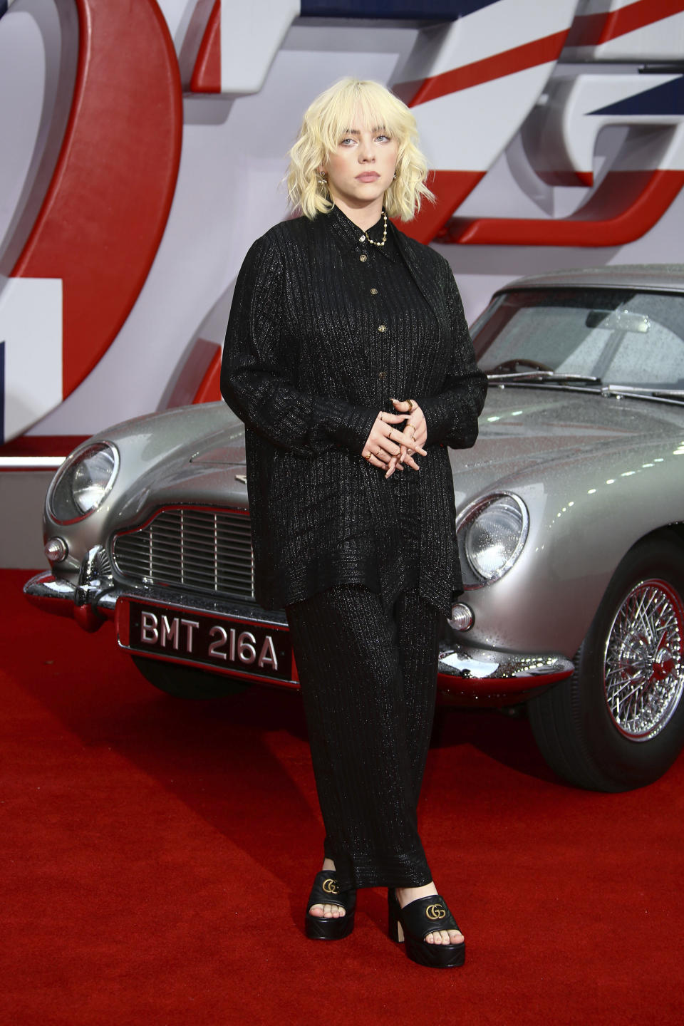 Billie Eilish poses on the red carpet of the new film from the James Bond franchise “No Time to Die.” - Credit: Joel C Ryan/Invision/AP