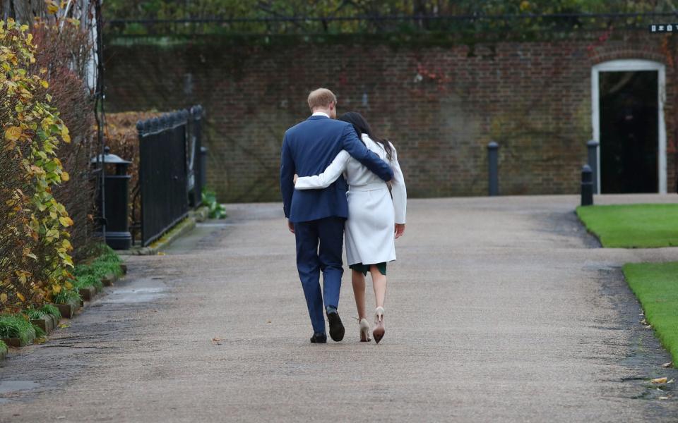 Prince Harry and Meghan Markle after a photocall at Kensington Palace - Rex