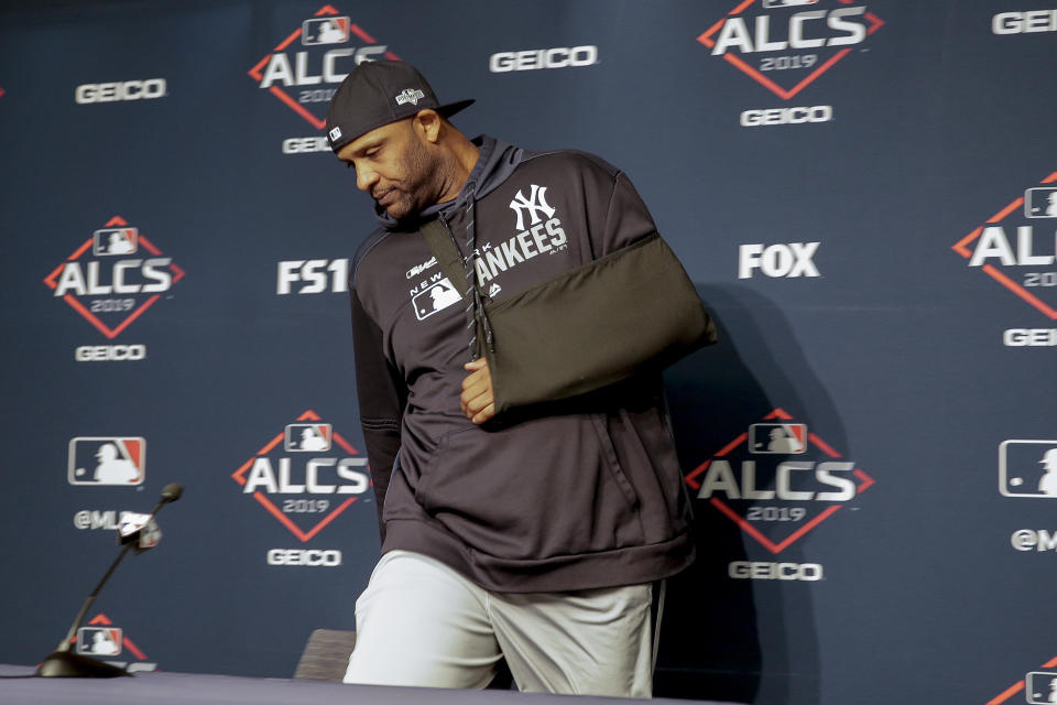 New York Yankees pitcher CC Sabathia arrives at a news conference to answer questions before Game 5 of baseball's American League Championship Series against the Houston Astros, Friday, Oct. 18, 2019, in New York. (AP Photo/Seth Wenig)