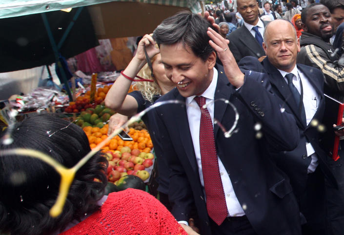 Labour leader Ed Miliband after he was pelted with eggs during a campaign visit in East Street market in Walworth, south London, in 2013. (Photo: Lewis Whyld/PA Images via Getty Images)