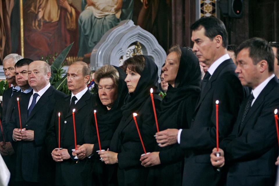 Valentin Yumashev (far right) is pictured next to his wife Tatyana at Boris Yeltsin’s funeral in 2007  (REUTERS)