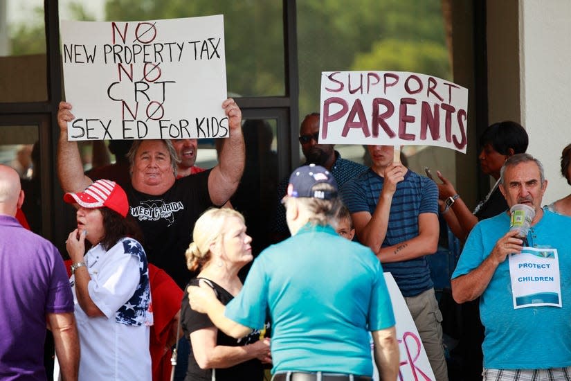 A crowd gathers May 3 outside the Duval County School Board where a resolution on parental rights law was to be heard.