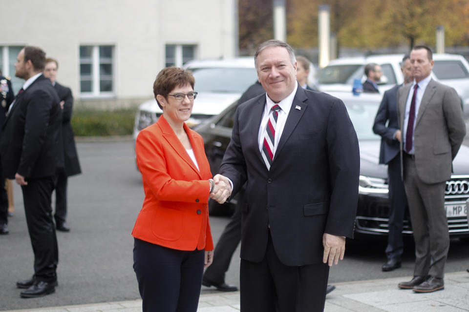 German Defense Minister Annegret Kramp-Karrenbauer, left, welcomes United States Secretary of State Mike Pompeo for a meeting at the defence ministry in Berlin, Germany, Friday, Nov. 8, 2019. (AP Photo/Markus Schreiber)