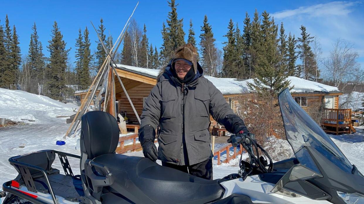 Bobby Drygeese, who runs a tourist camp near Dettah, N.W.T., says he hasn't been taking as many summer bookings so far this year. 'A lot of people are still worried about the fires and all that,' he said. (Travis Burke/CBC - image credit)