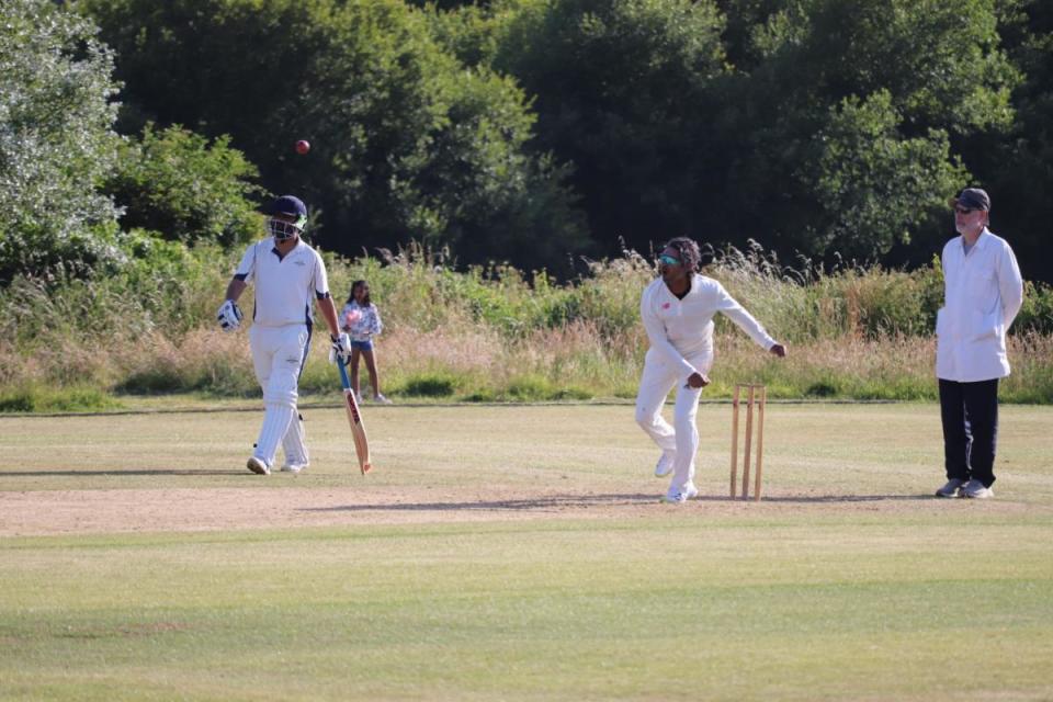 Sri Lanka legend Kumar Sangakkara, centre, took 2-18 after scoring 126 against Abbotsbury <i>(Image: STEVE BUDD)</i>