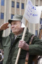 <p>Roy Fansler stands with an M1 Garand rifle at a gun rally Saturday, April 14, 2018, in front of the Wyoming Supreme Court in Cheyenne, Wyo. About 100 people took part including a handful openly carrying firearms. (Photo: Mead Gruver/AP) </p>