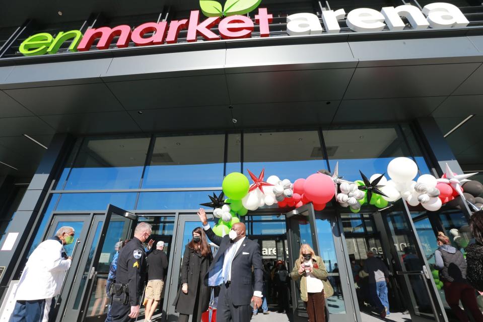 Savannah Mayor Van Johnson greets visitors as they arrive on Saturday at the Enmarket Arena for a community open house.