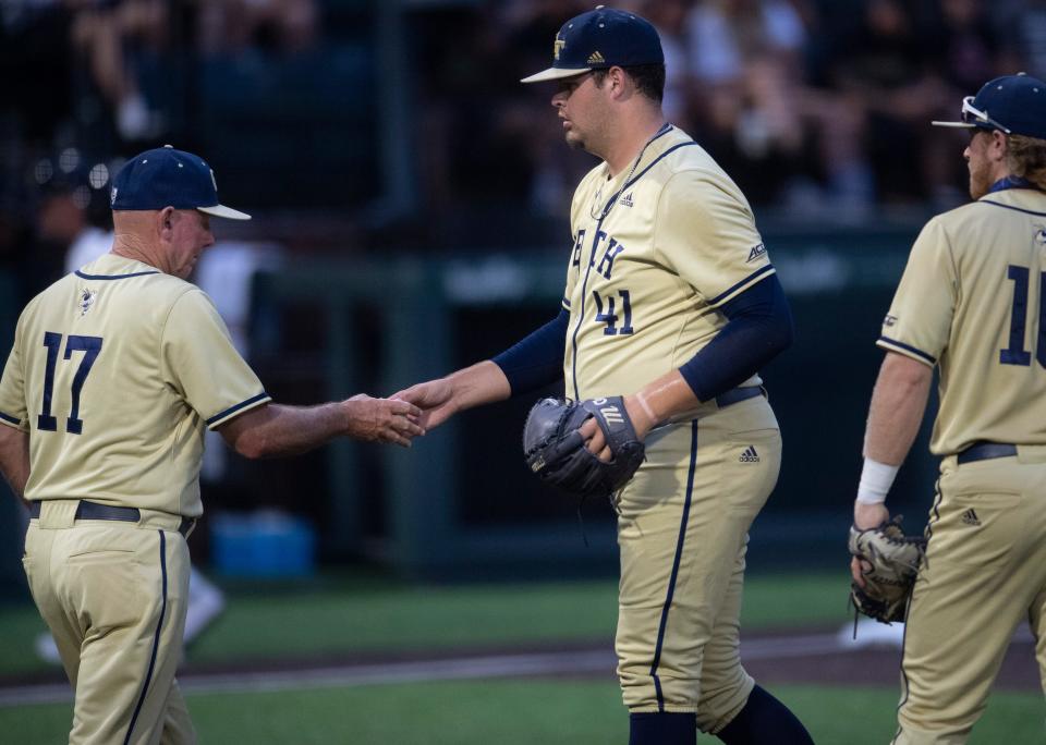 Georgia Tech pitcher Zach Maxwell (41) hands the ball over to head coach Danny Hall after facing two Vanderbilt batters in their game during the NCAA Division I Baseball Regionals at Hawkins Field Saturday, June 5, 2021 in Nashville, Tenn. 