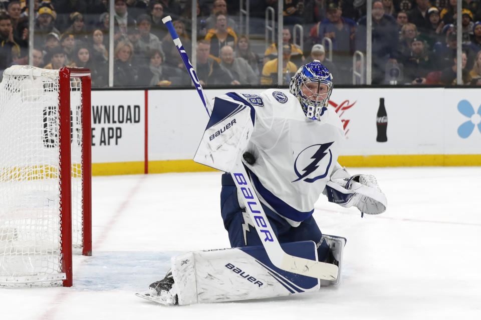 Tampa Bay Lightning goaltender Andrei Vasilevskiy makes a save against the Boston Bruins during the second period of an NHL hockey game Saturday, March 7, 2020, in Boston. (AP Photo/Winslow Townson)