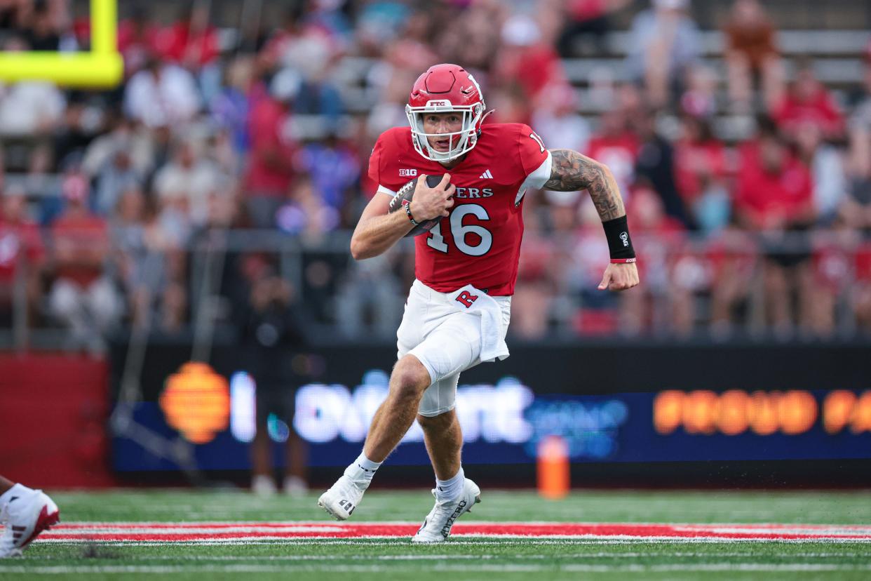 Aug 29, 2024; Piscataway, New Jersey, USA; Rutgers Scarlet Knights quarterback Athan Kaliakmanis (16) carries the ball during the first half against the Howard Bison at SHI Stadium.