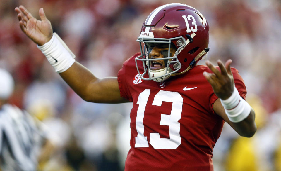 Alabama quarterback Tua Tagovailoa (13) gestures after throwing a touchdown pass during the first half against Missouri in an NCAA college football game Saturday, Oct. 13, 2018, in Tuscaloosa, Ala. (AP Photo/Butch Dill)