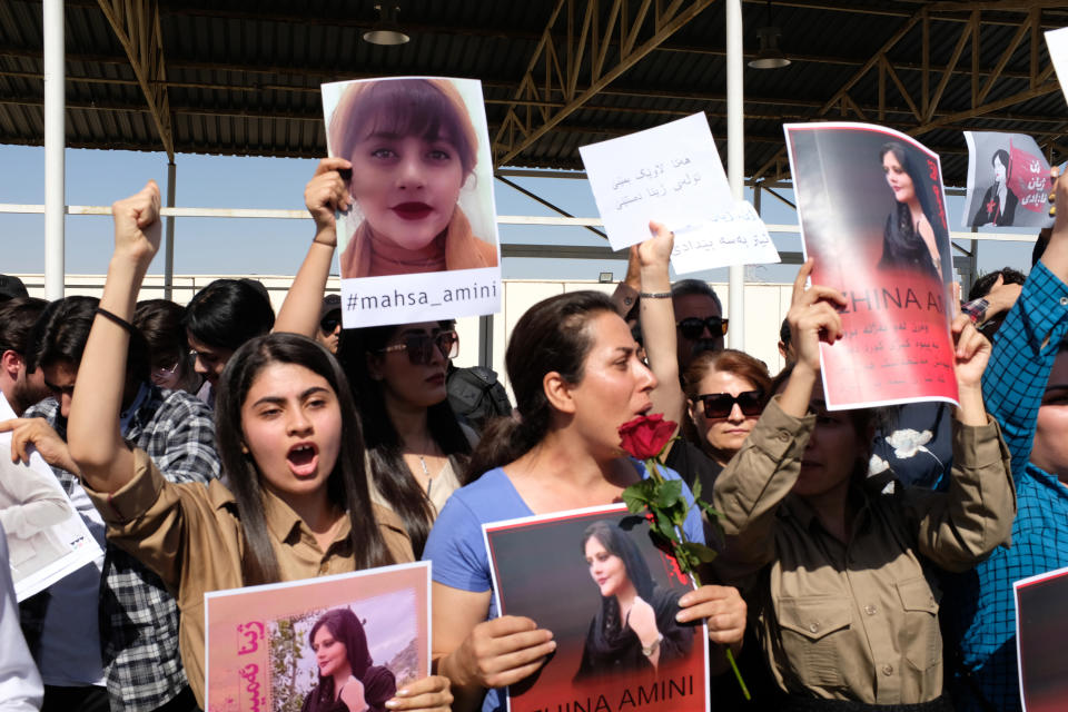 Protesters gather outside the UN headquarters in Erbil on Sept. 24, 2022, to protest the death of Masha Amini, who had fallen into a coma for three days after being detained by the morality police in Tehran, Iran. Iran has accused Kurdish opposition groups in exile of orchestrating the wave of protests across the country over the past two weeks. But Kurdish activists say the government is just trying to scapegoat them to distract from the domestic anger fueling the unrest.(AP Photo/Hawre Khalid, Metrography)