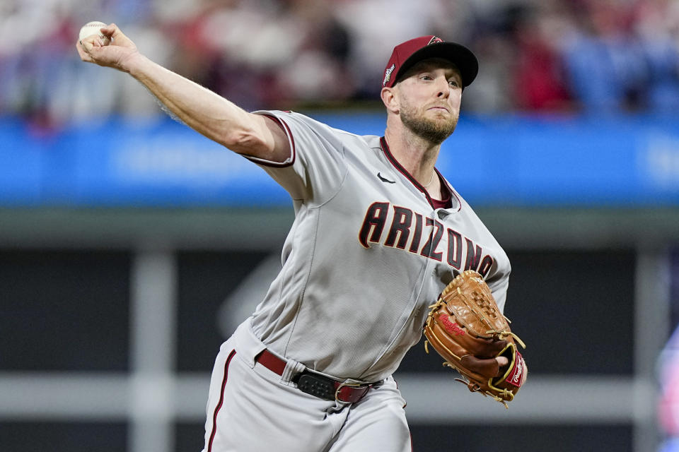 Arizona Diamondbacks starting pitcher Merrill Kelly throws against the Philadelphia Phillies during the first inning in Game 2 of the baseball NL Championship Series in Philadelphia, Tuesday, Oct. 17, 2023. (AP Photo/Brynn Anderson)